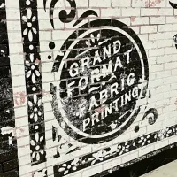 Signage Featuring DPI Faux Brick Paneling