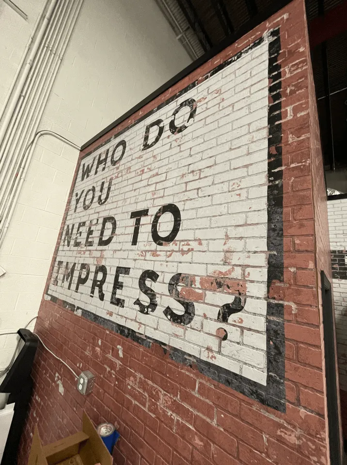 Signage Featuring DPI Faux Brick Paneling