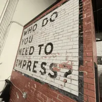 Signage Featuring DPI Faux Brick Paneling